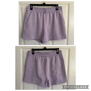 Size 8 Lululemon Solid Dark Lavender Softstreme 4" High-Rise Short.  In EUC!
